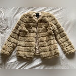 Beige faux fur coat